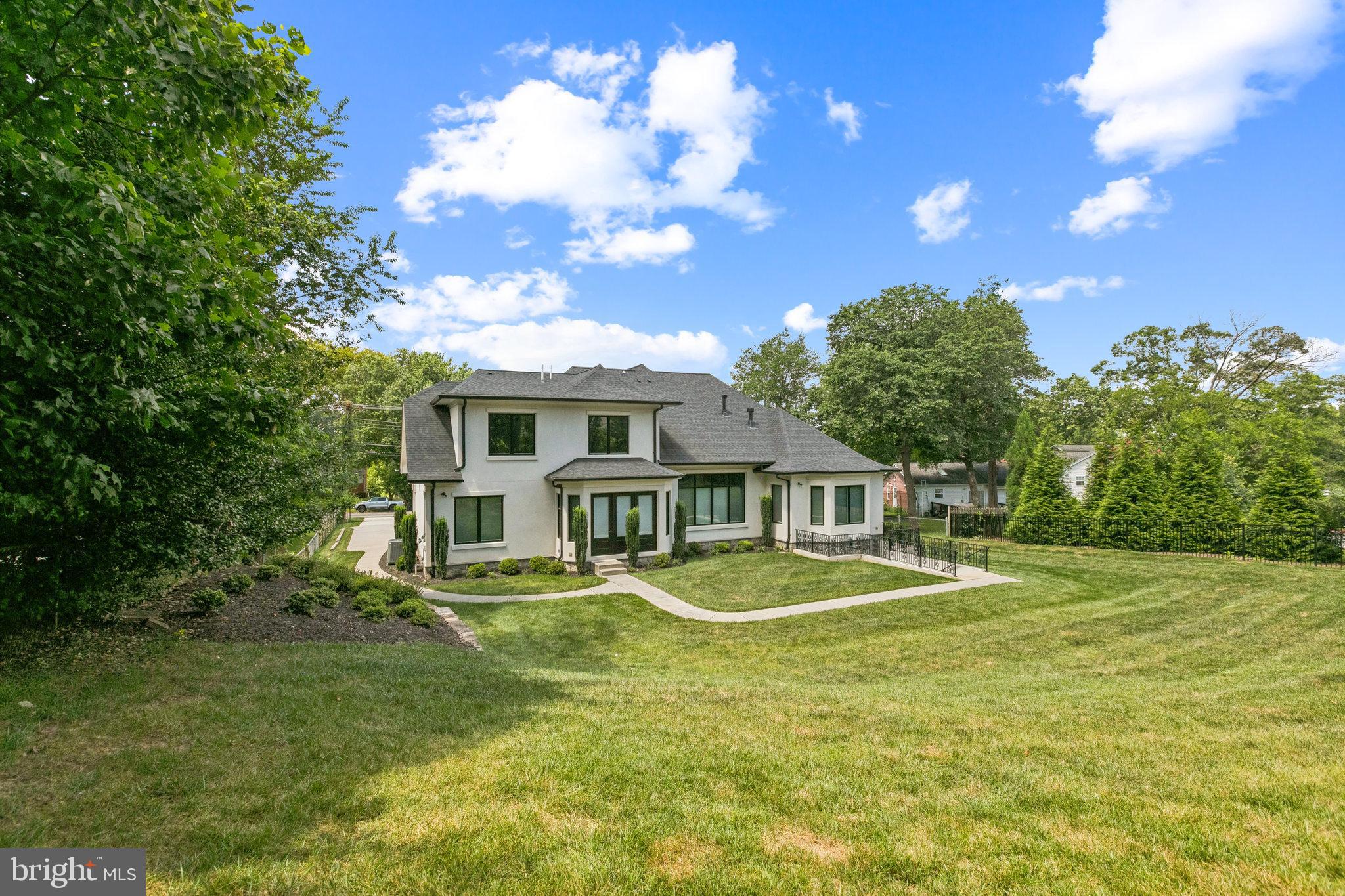 305 Old Courthouse Road Northeast Vienna, VA 22180 - Photo 61 of 69 a view of a house with a backyard
