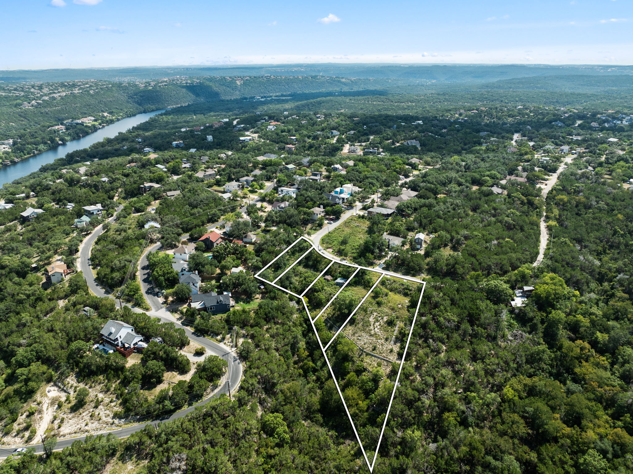 2314 Little Beaver Trail Austin, TX 78734 - Photo 5 of 27 an aerial view of residential houses with city view and green space