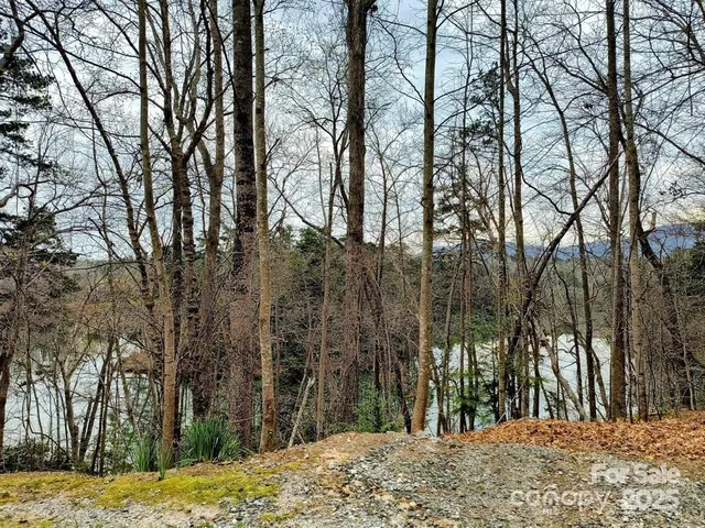 a view of a backyard with sitting area