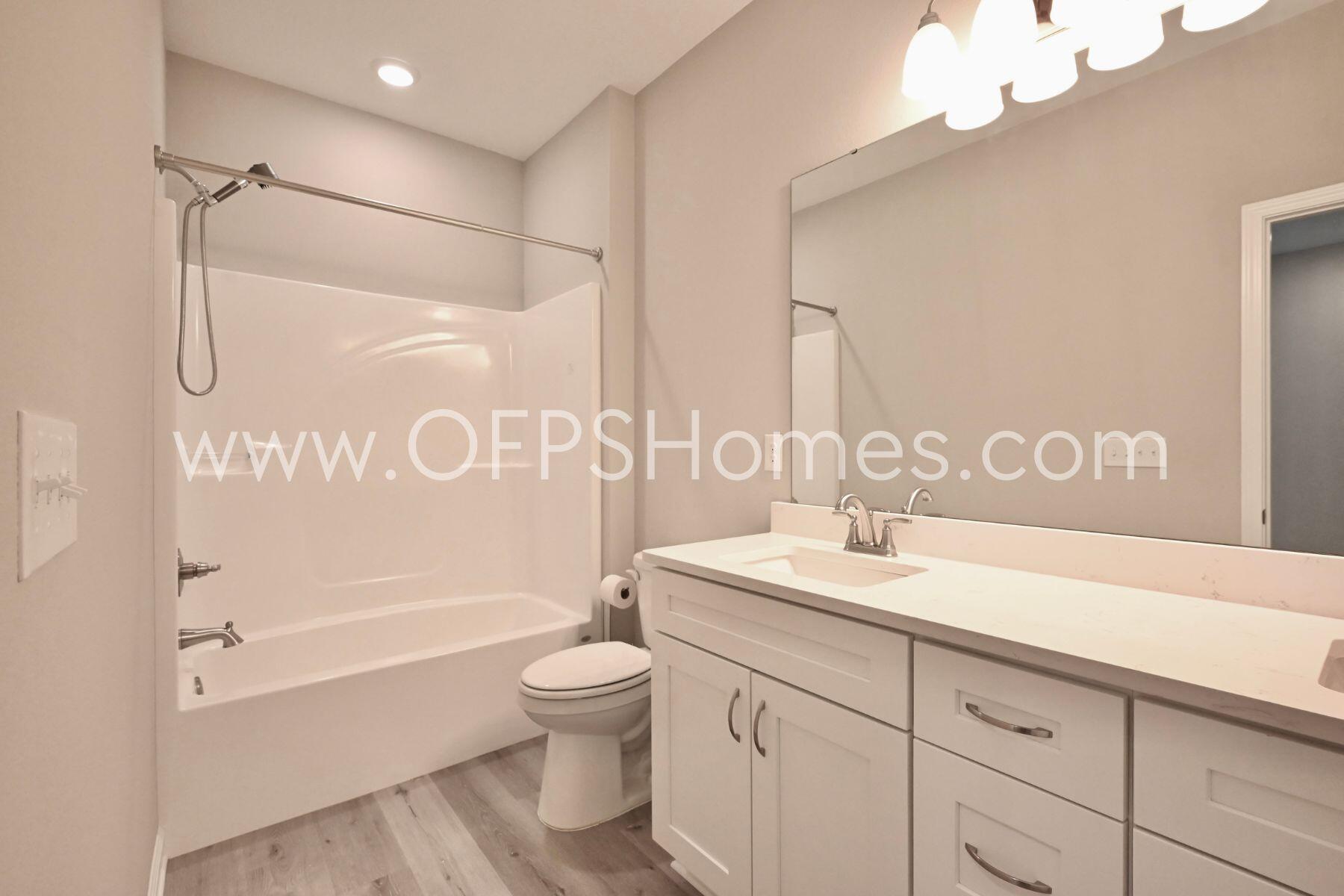 113 Shady Lane Crestview, FL 32536 - Photo 15 of 25 a bathroom with a sink a toilet and shower