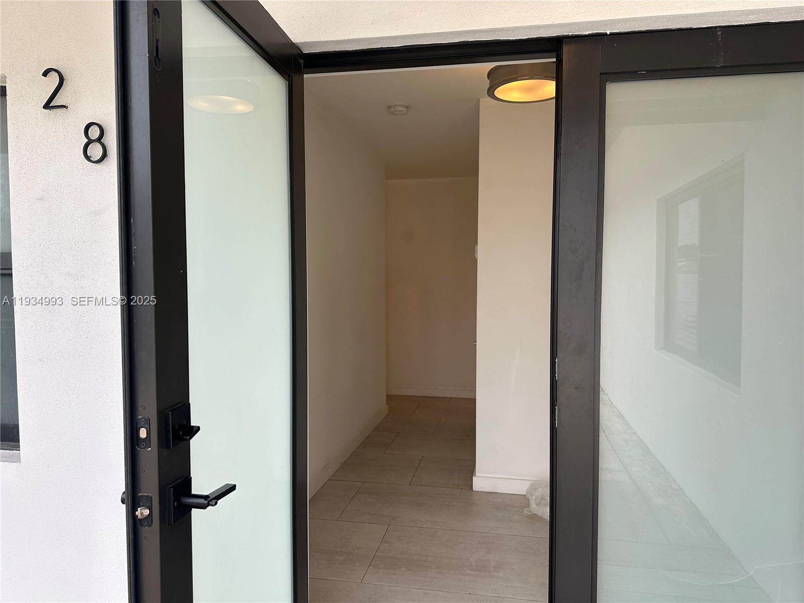 2832 Southwest 124th Court Miami, FL 33175 - Photo 12 of 30 a view of a bathroom from a corridor
