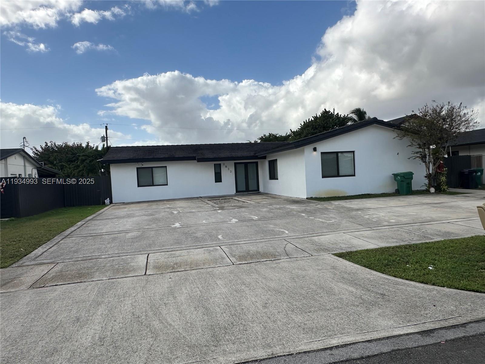 2832 Southwest 124th Court Miami, FL 33175 - Photo 30 of 30 a view of a house with a yard