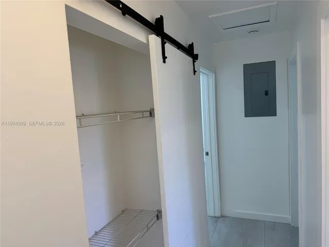 a kitchen with stainless steel appliances granite countertop a refrigerator a stove a sink and a refrigerator