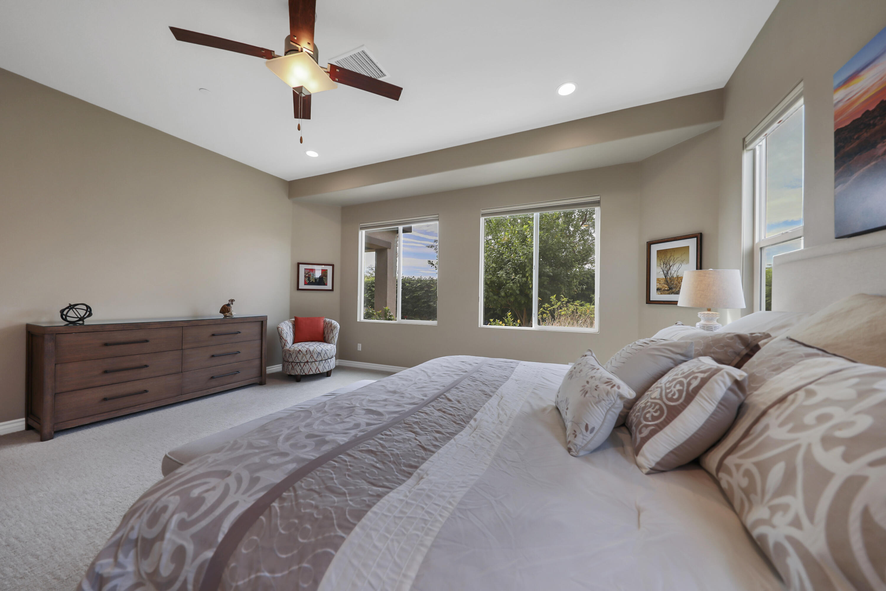 85685 Treviso Drive Indio, CA 92203 - Photo 16 of 32 a bed room with a bed and furniture