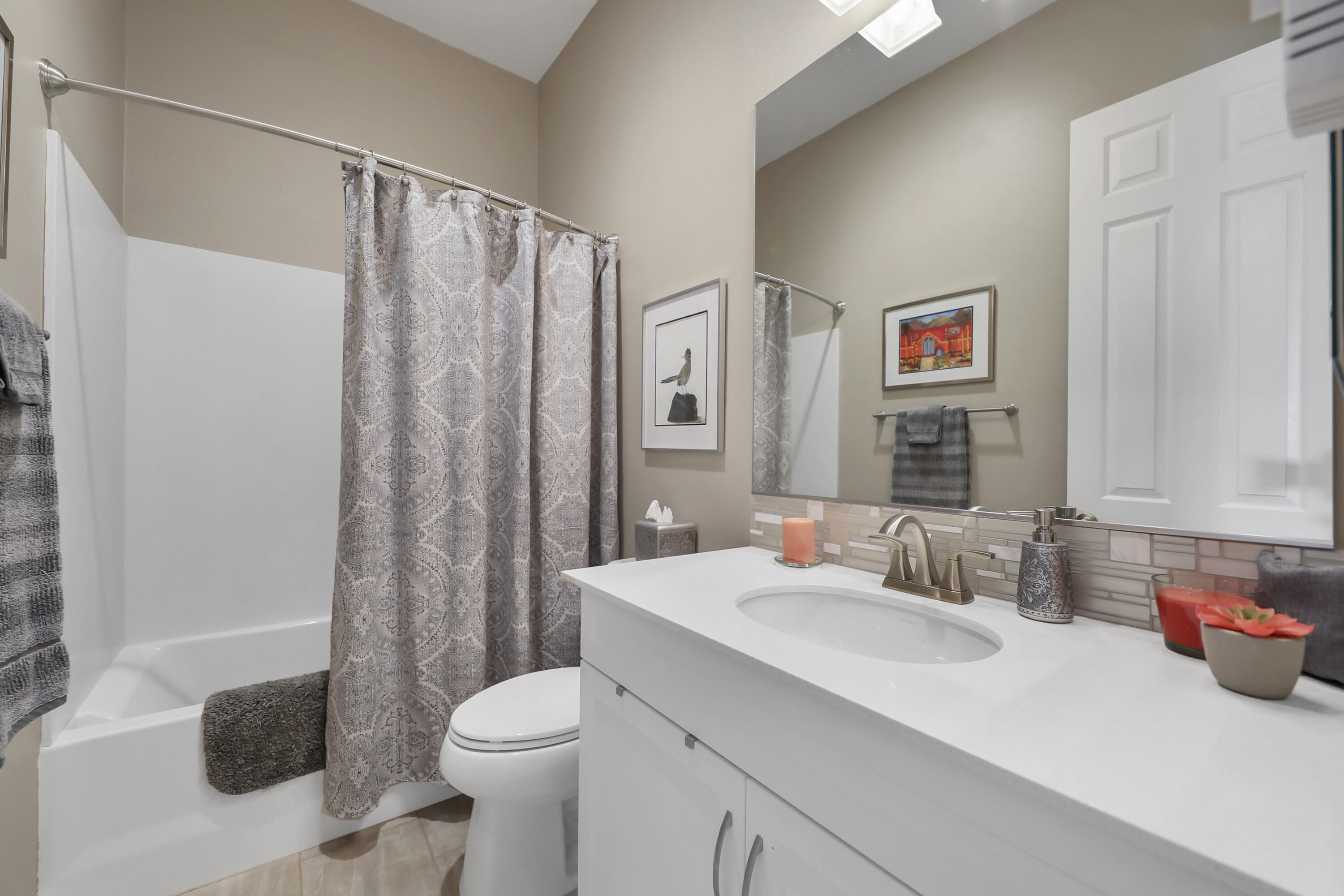 85685 Treviso Drive Indio, CA 92203 - Photo 20 of 32 a bathroom with a sink toilet and shower