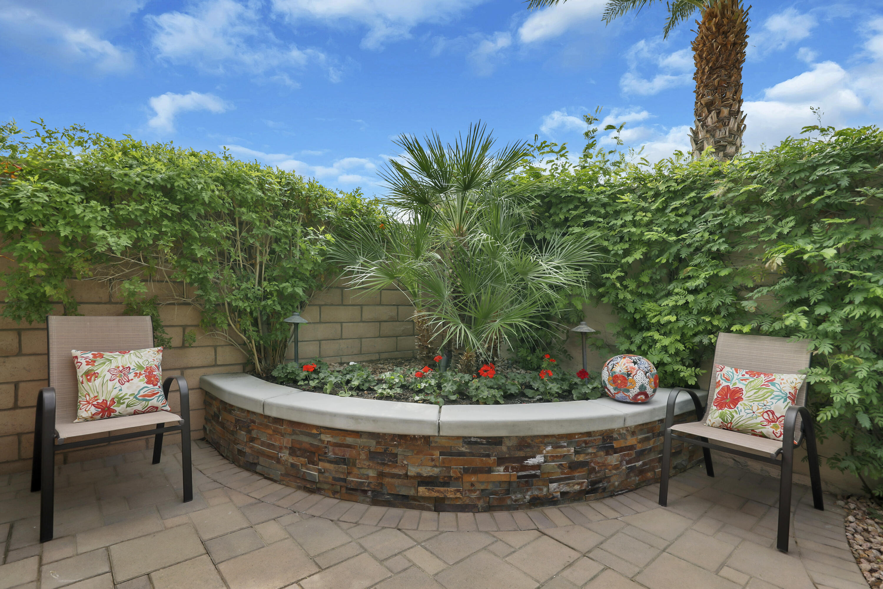 85685 Treviso Drive Indio, CA 92203 - Photo 23 of 32 a view of a sitting area in front of a house