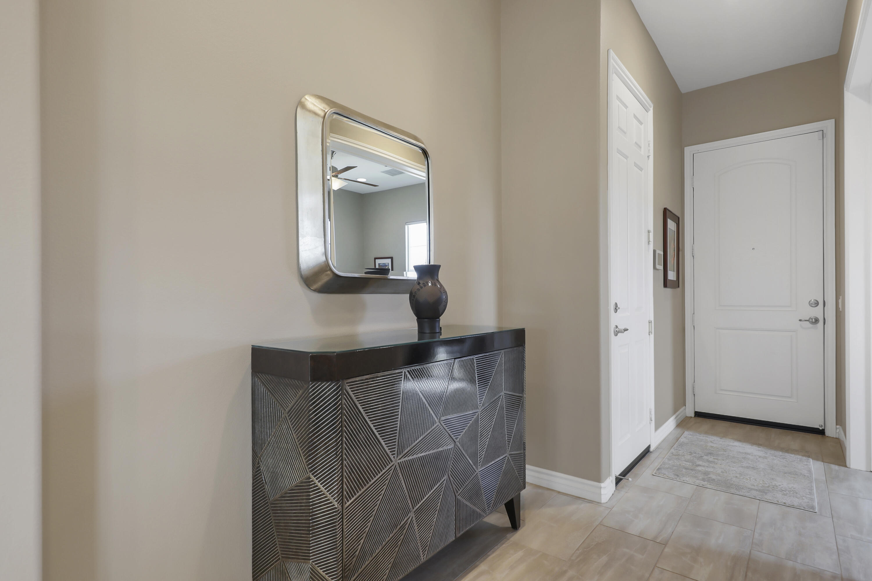 85685 Treviso Drive Indio, CA 92203 - Photo 3 of 32 a bathroom with a sink and a mirror