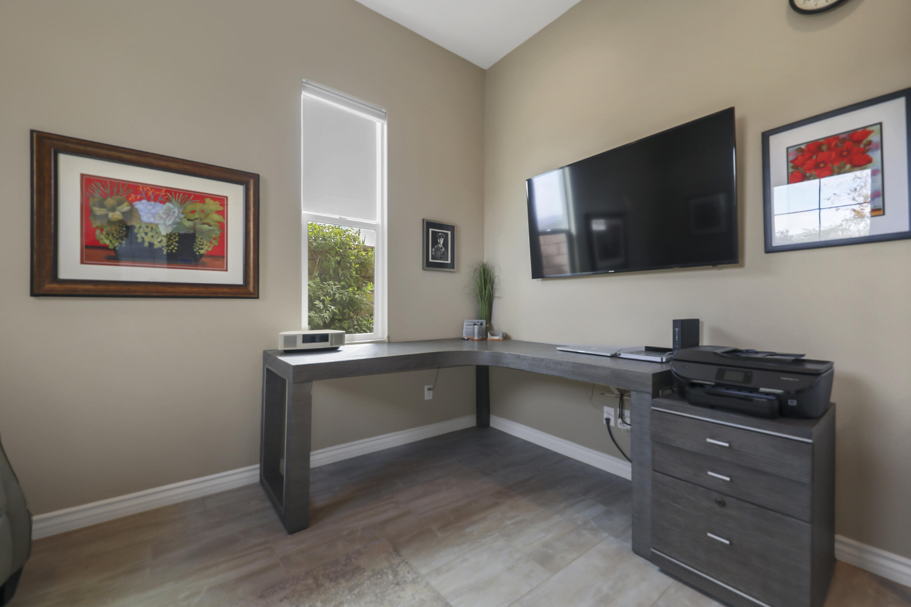 85685 Treviso Drive Indio, CA 92203 - Photo 5 of 32 a kitchen with a stove and a flat screen tv
