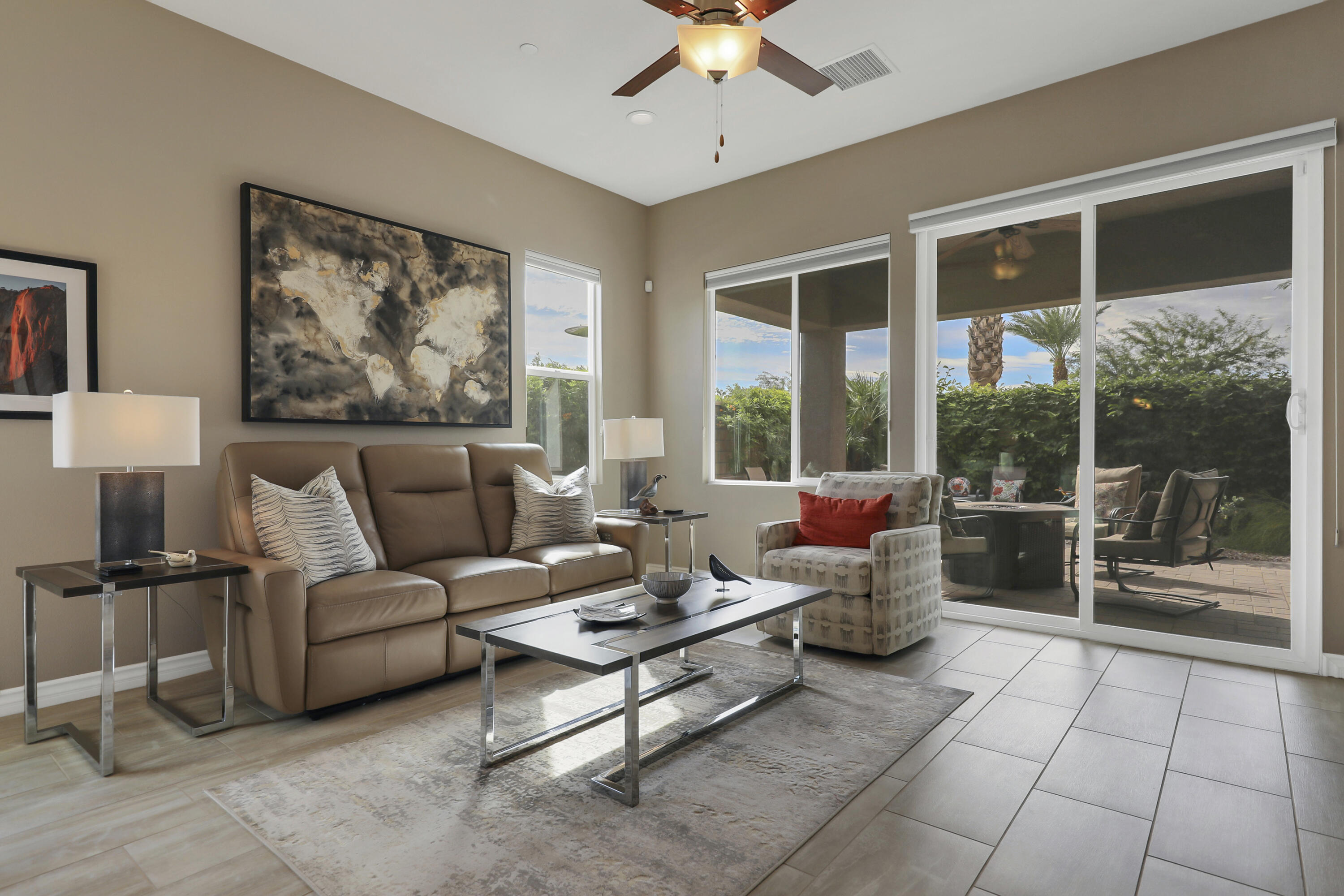 85685 Treviso Drive Indio, CA 92203 - Photo 6 of 32 a living room with furniture and a large window