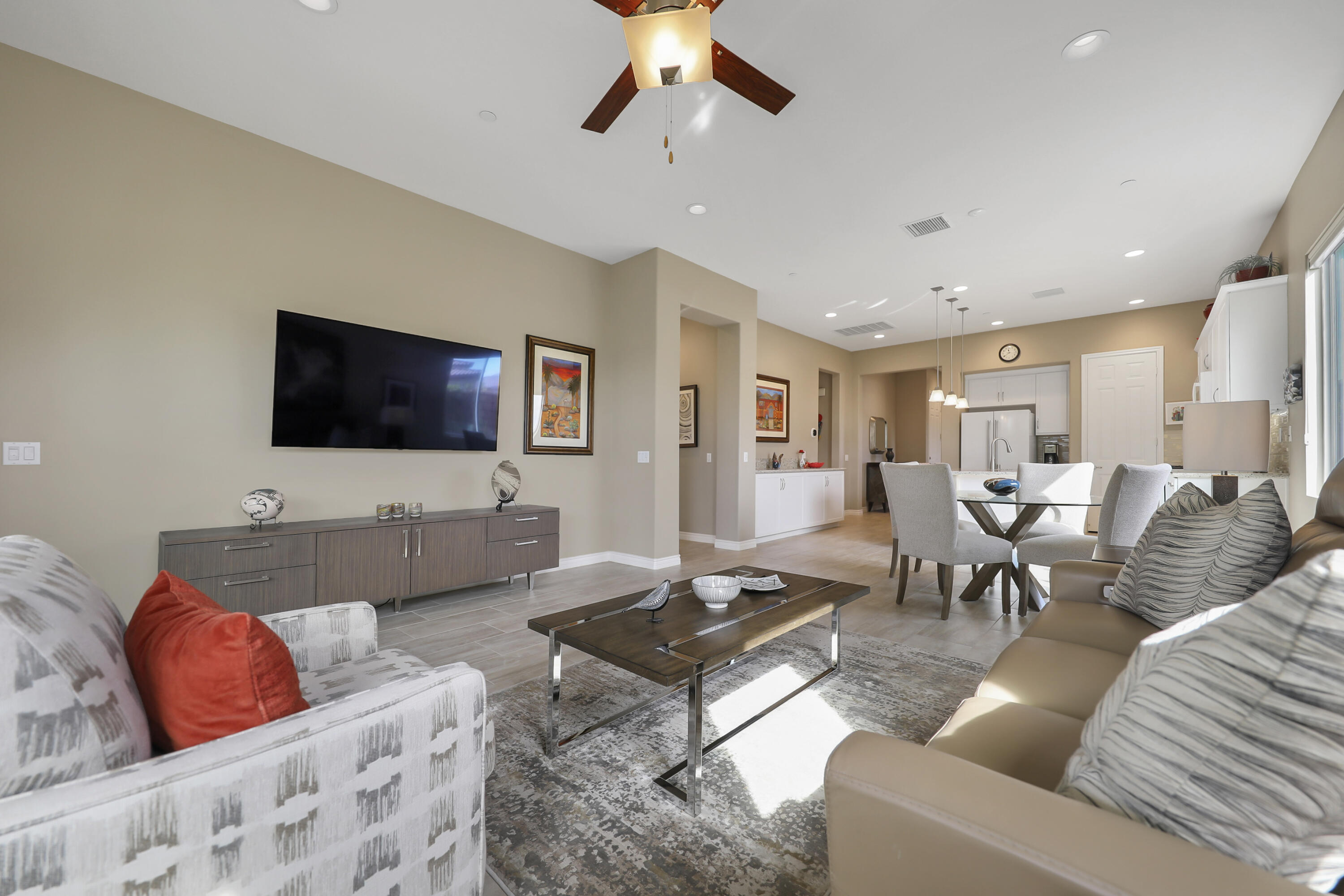 85685 Treviso Drive Indio, CA 92203 - Photo 9 of 32 a living room with furniture and a flat screen tv