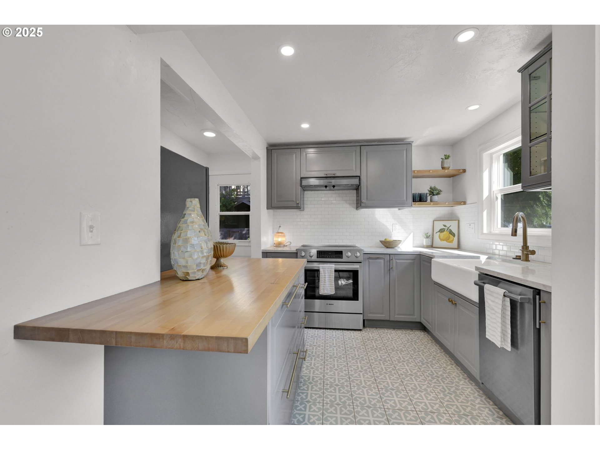 2424 Nixon Street Eugene, OR 97403 - Photo 13 of 48 a kitchen with counter top space cabinets and stainless steel appliances