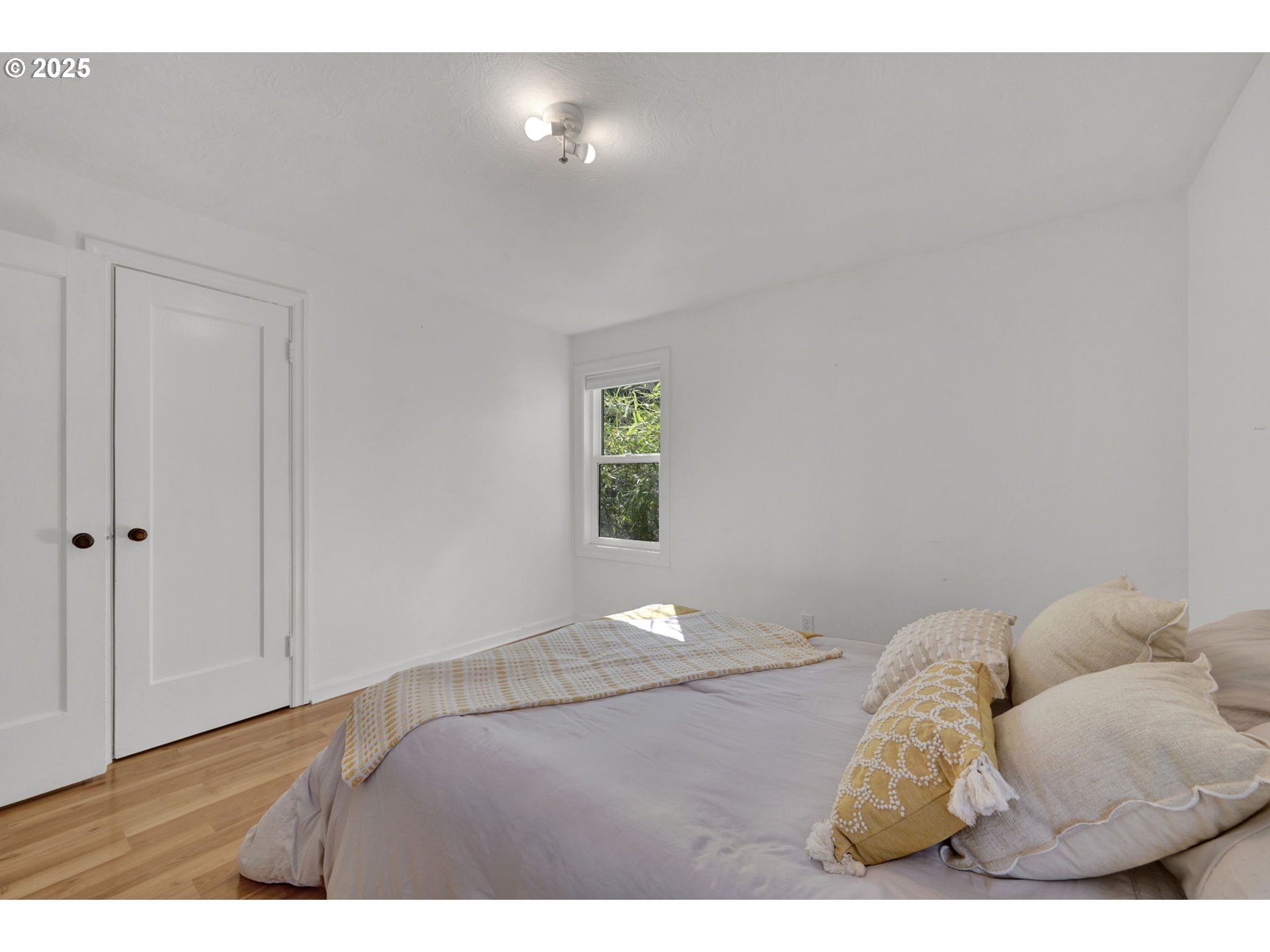 2424 Nixon Street Eugene, OR 97403 - Photo 20 of 48 a bedroom with a bed and window