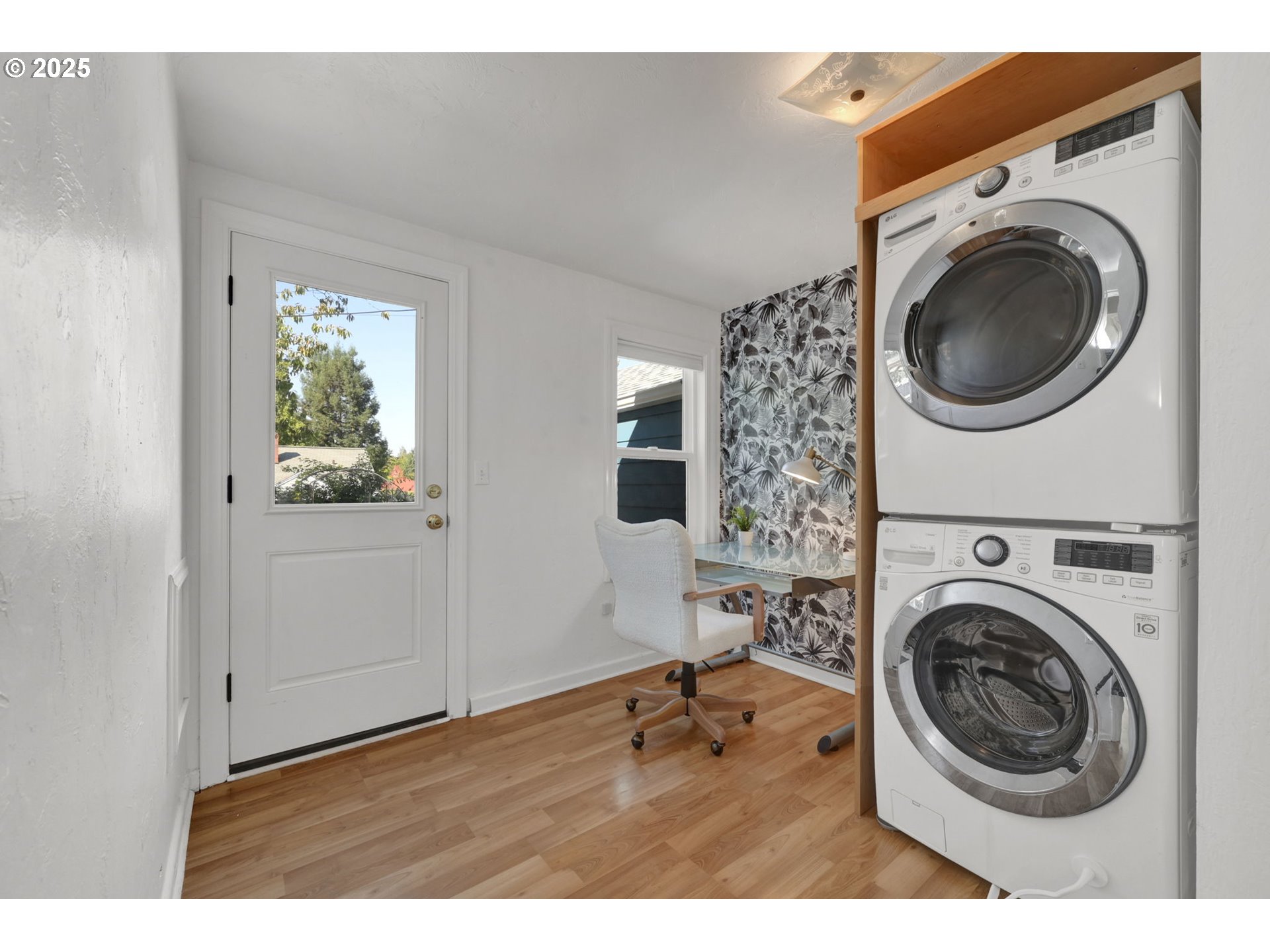 2424 Nixon Street Eugene, OR 97403 - Photo 25 of 48 a view of a hallway with washer and dryer