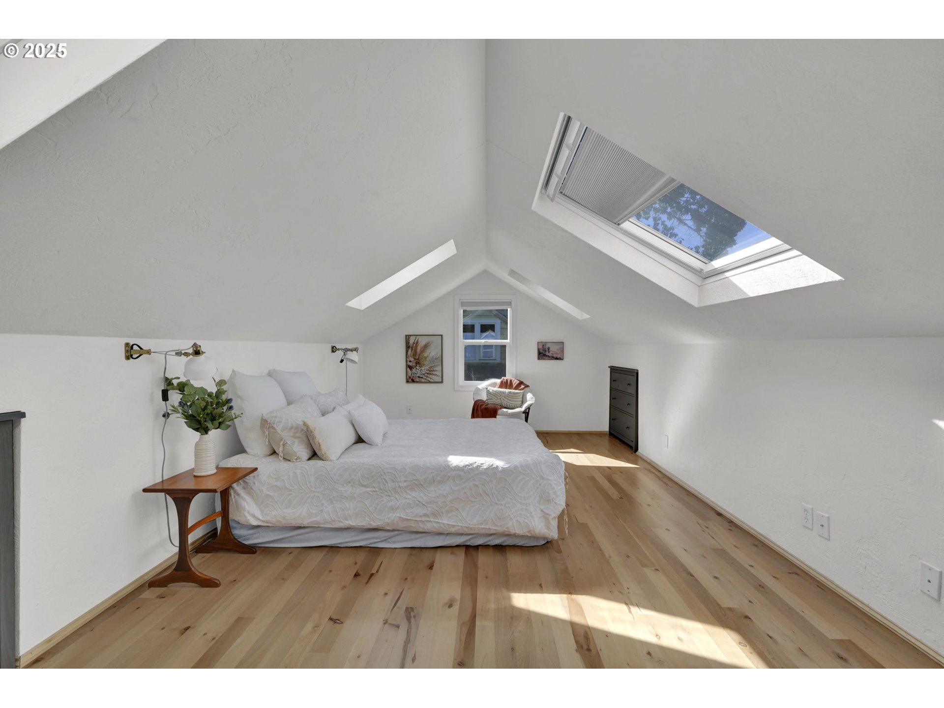 2424 Nixon Street Eugene, OR 97403 - Photo 27 of 48 a living room with furniture and a wooden floor