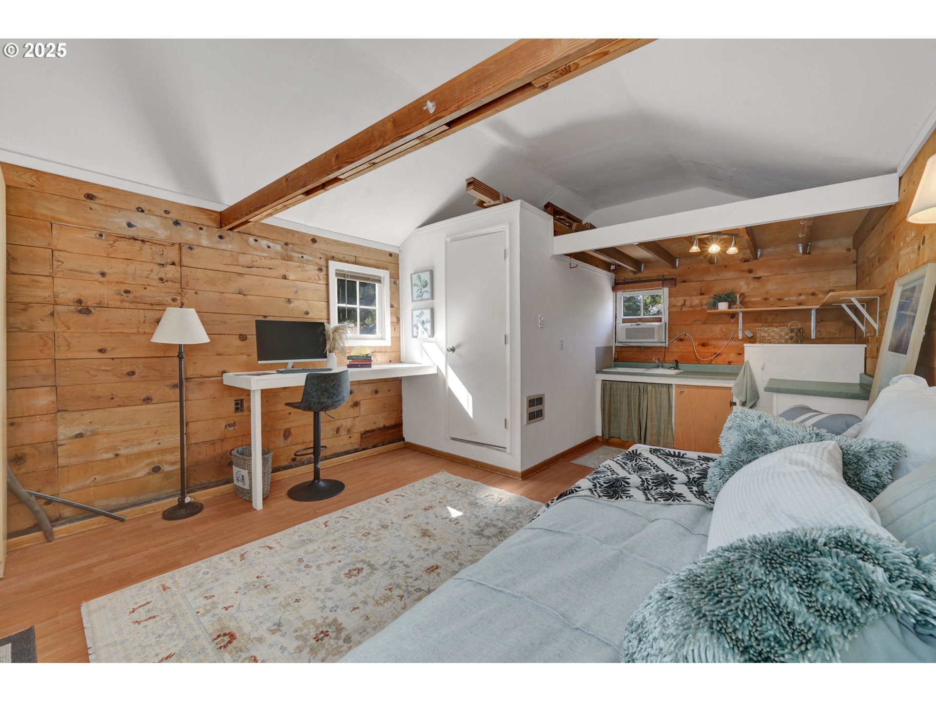 2424 Nixon Street Eugene, OR 97403 - Photo 34 of 48 a living room with a couch and a table