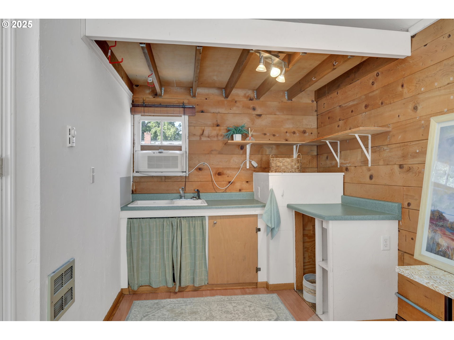 2424 Nixon Street Eugene, OR 97403 - Photo 35 of 48 a kitchen with a refrigerator and a sink