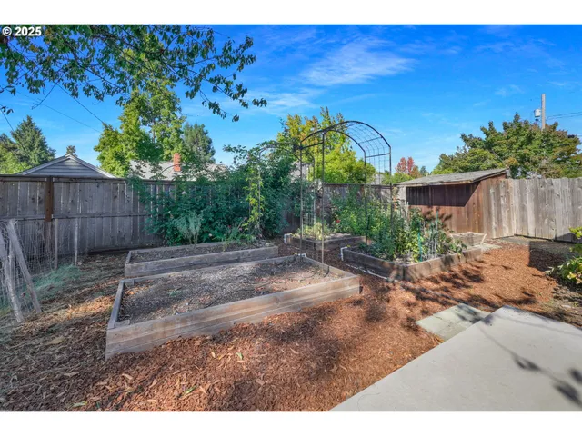 a backyard of a house with lots of green space