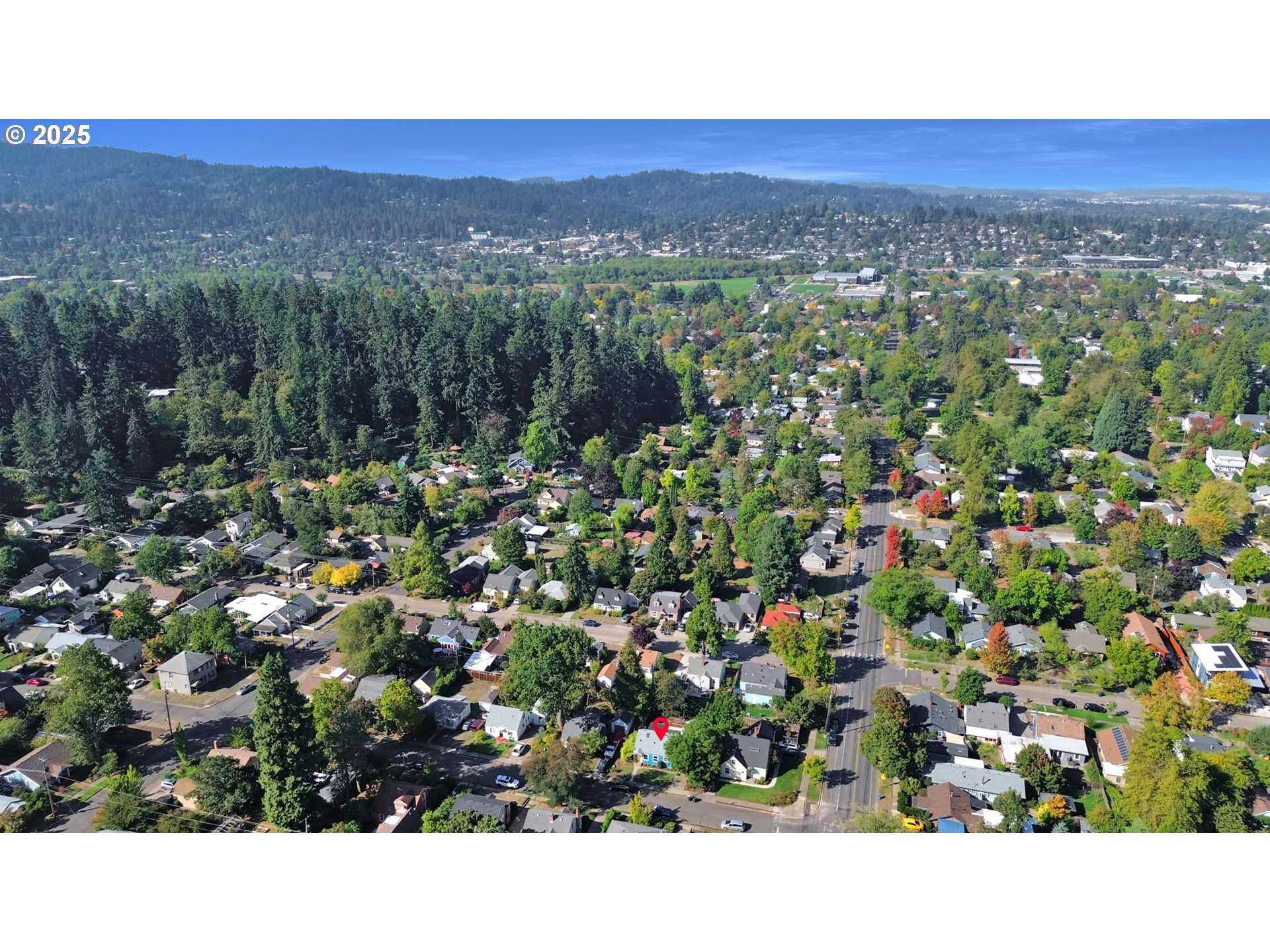 2424 Nixon Street Eugene, OR 97403 - Photo 47 of 48 a view of a city with lush green forest