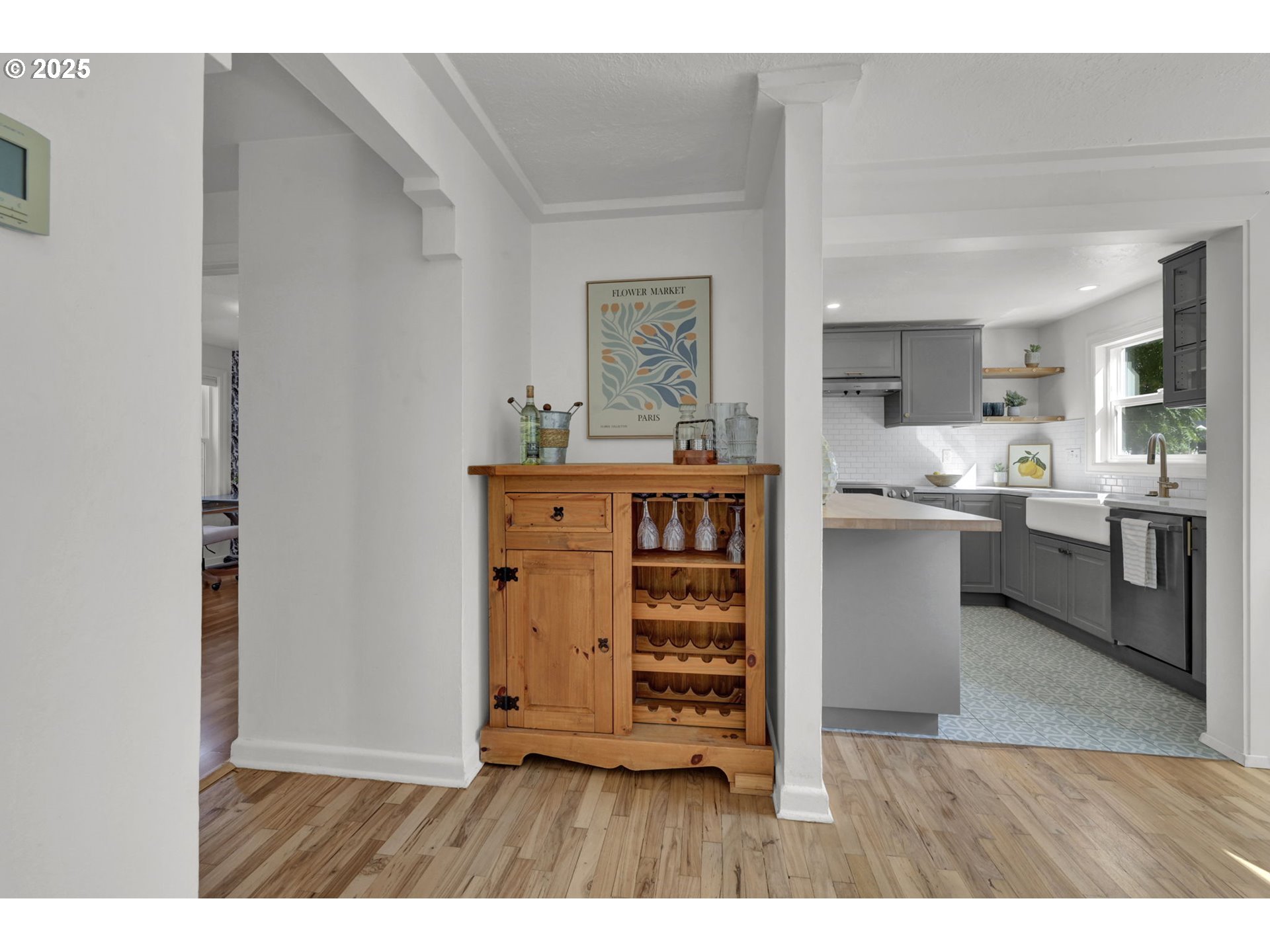 2424 Nixon Street Eugene, OR 97403 - Photo 7 of 48 a kitchen with kitchen island a stove a sink and a refrigerator