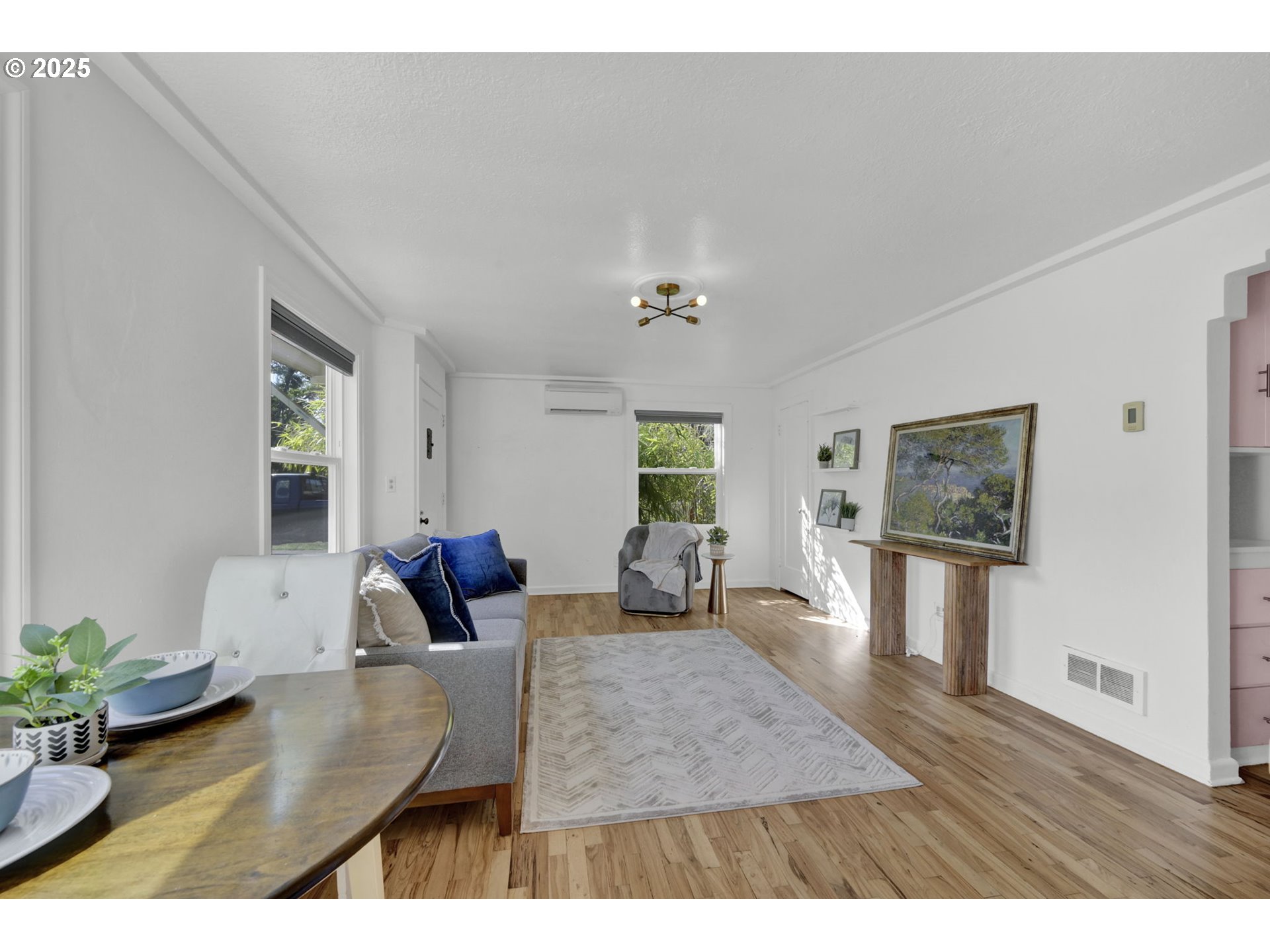 2424 Nixon Street Eugene, OR 97403 - Photo 8 of 48 a living room with furniture two window and wooden floor