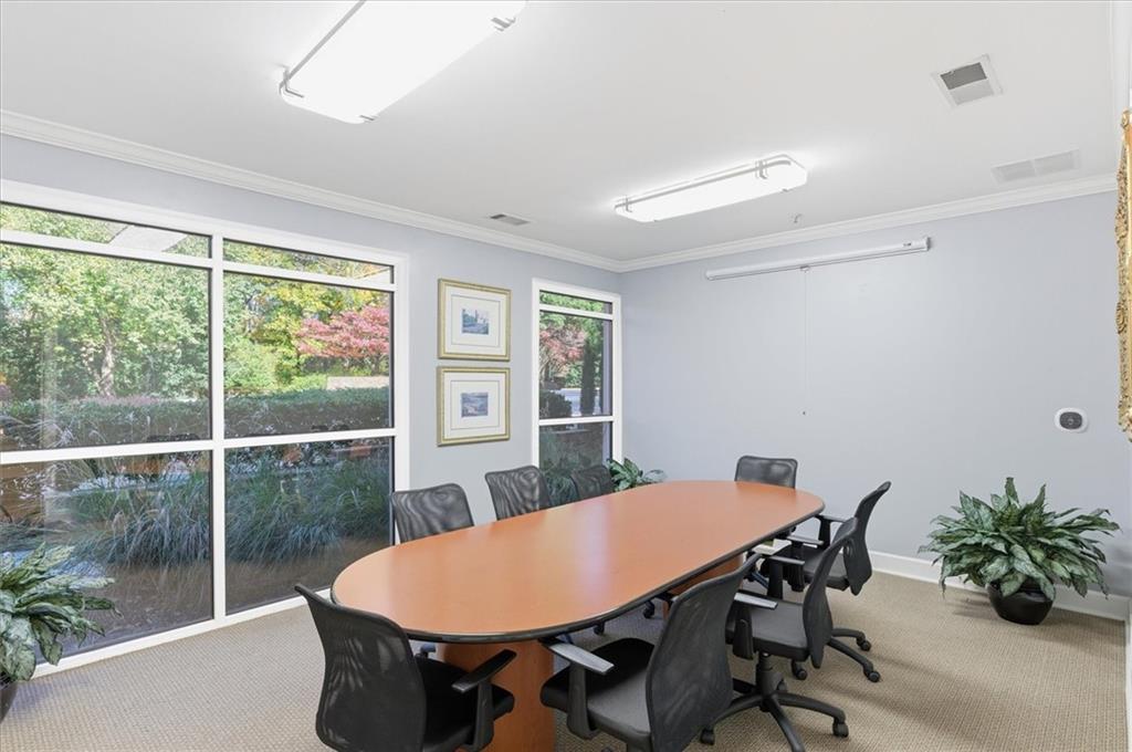 10 Perimeter Summit Boulevard, Unit 2410 Atlanta, GA 30319 - Photo 30 of 31 a view of a dining room with furniture window and outside view
