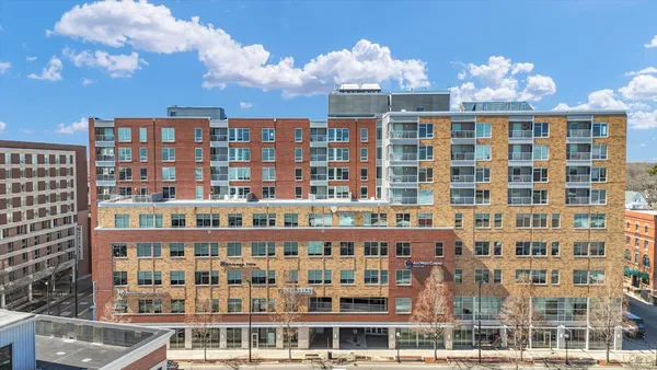 a front view of a building with balcony