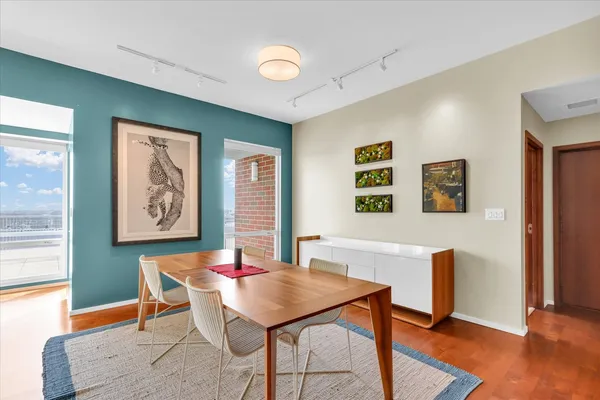 a view of a dining room with furniture