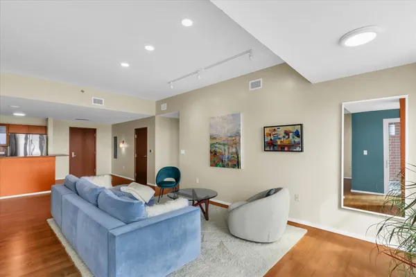 a living room with furniture and a couch