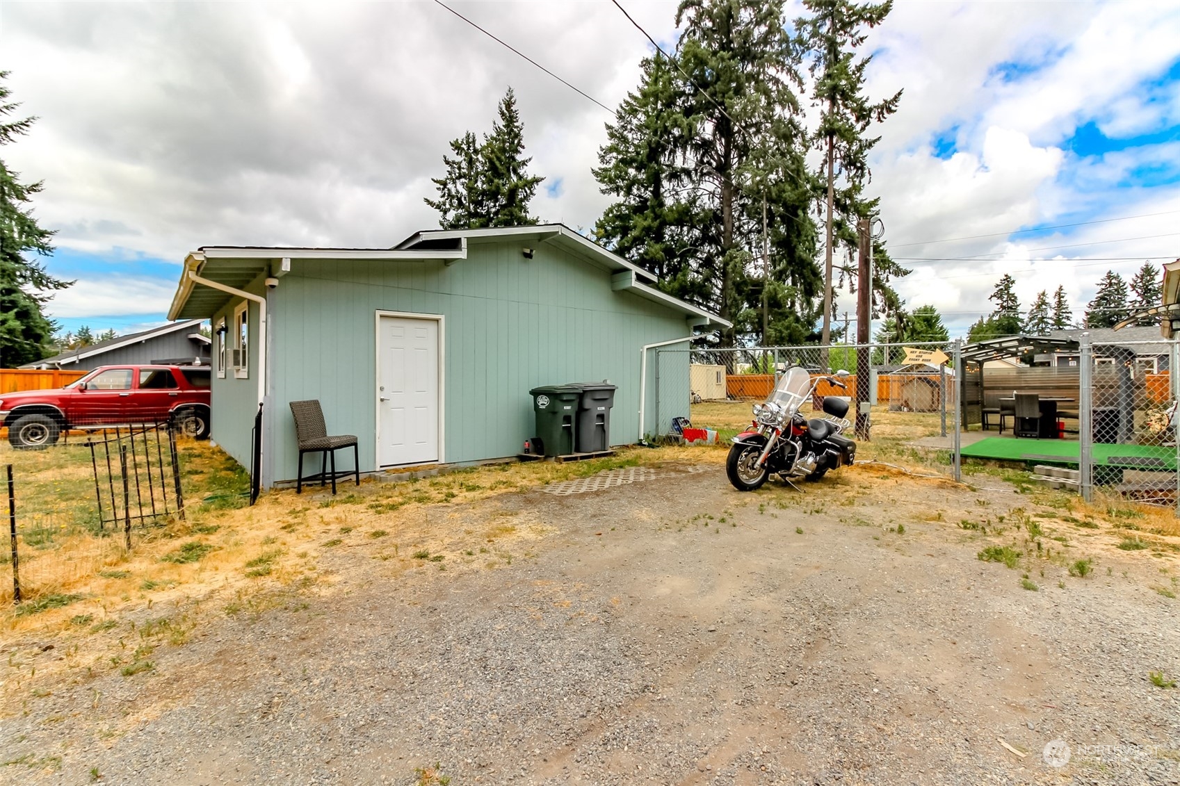 224 Military Road East Tacoma, WA 98445 - Photo 16 of 20 a view of a house with a patio