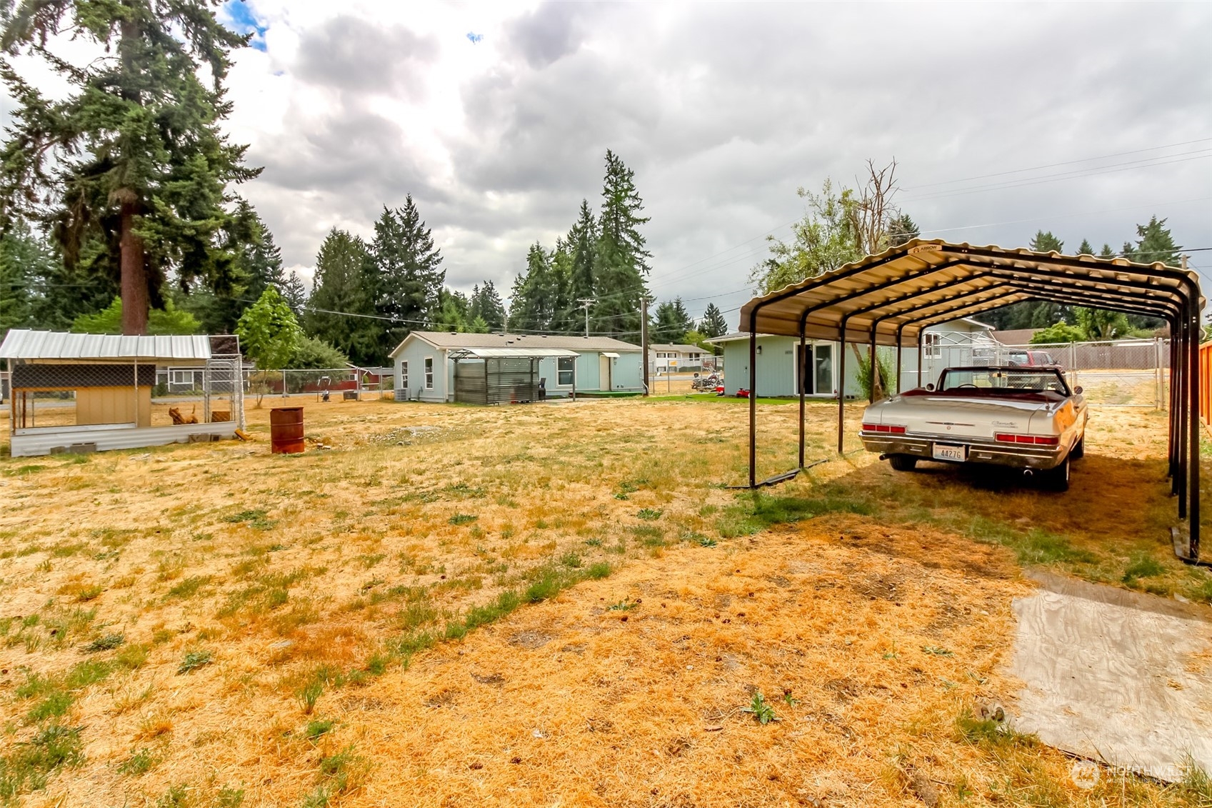 224 Military Road East Tacoma, WA 98445 - Photo 3 of 20 a view of a house with car parked