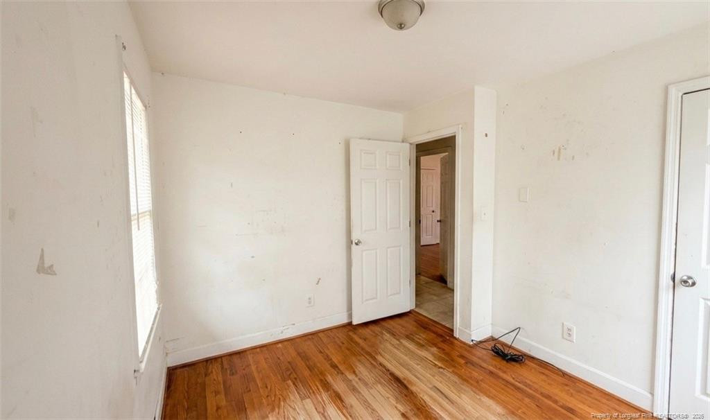 107 East Thigpen Road Conetoe, NC 27819 - Photo 11 of 13 a view of a room with wooden floor
