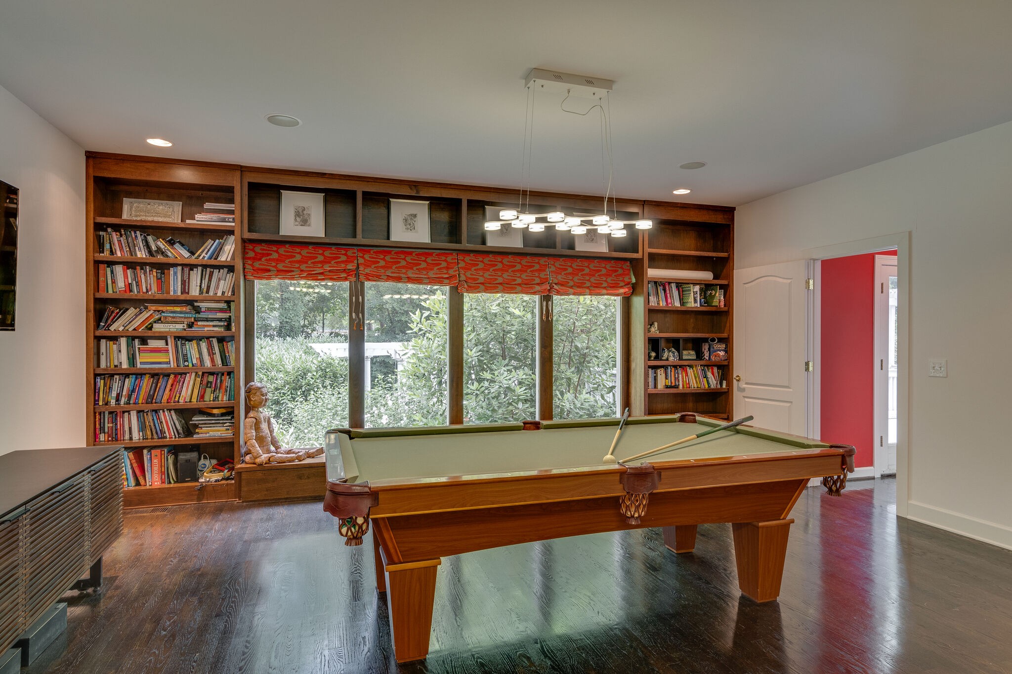 621 Post Oak Circle Brentwood, TN 37027 - Photo 28 of 50 a room with lots of furniture and a book shelf