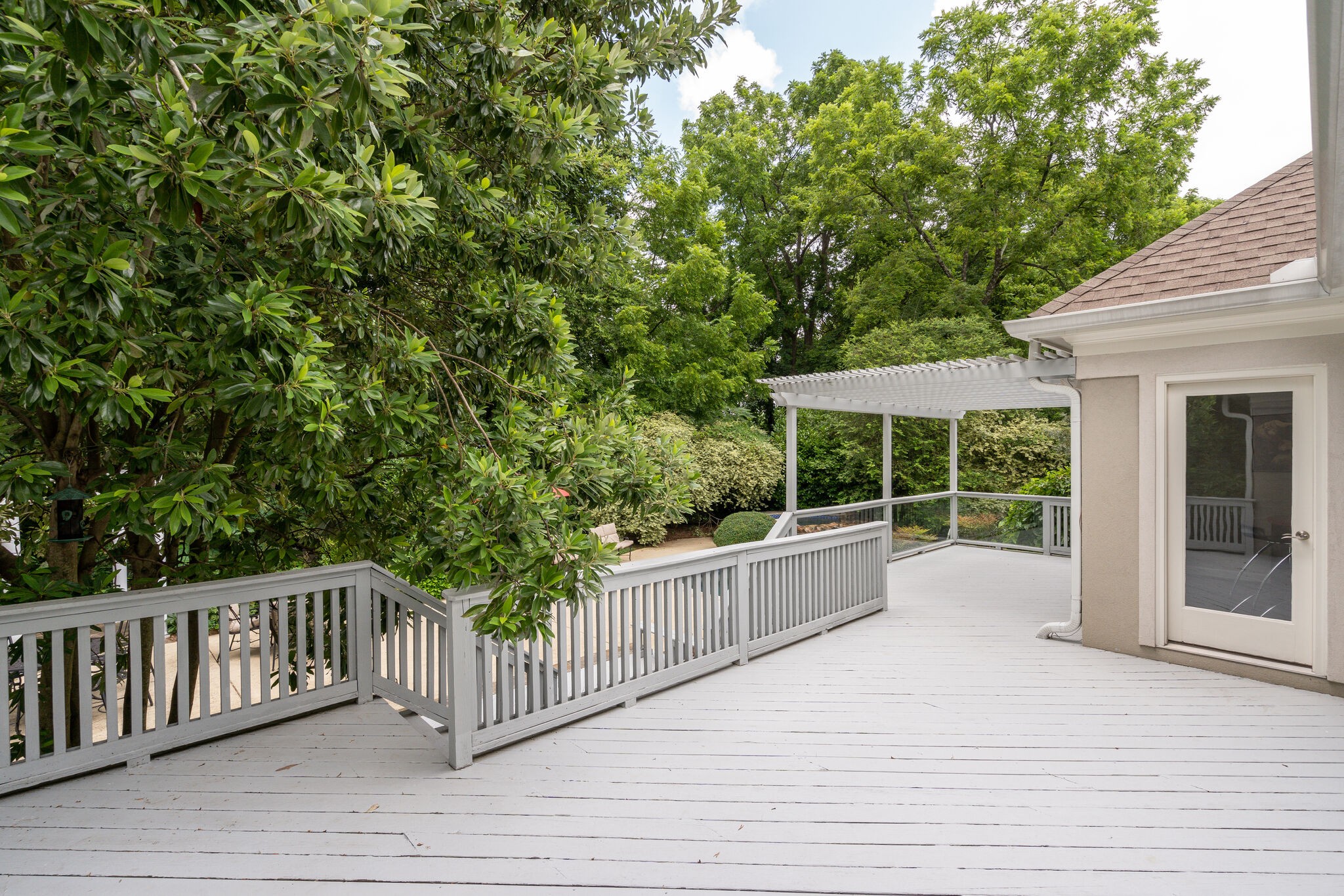621 Post Oak Circle Brentwood, TN 37027 - Photo 42 of 50 a porch with a wooden bench