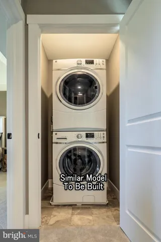 a view of washer and dryer in a utility room