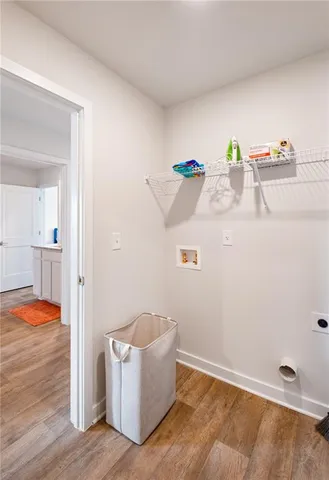 a room with toys and wooden floor