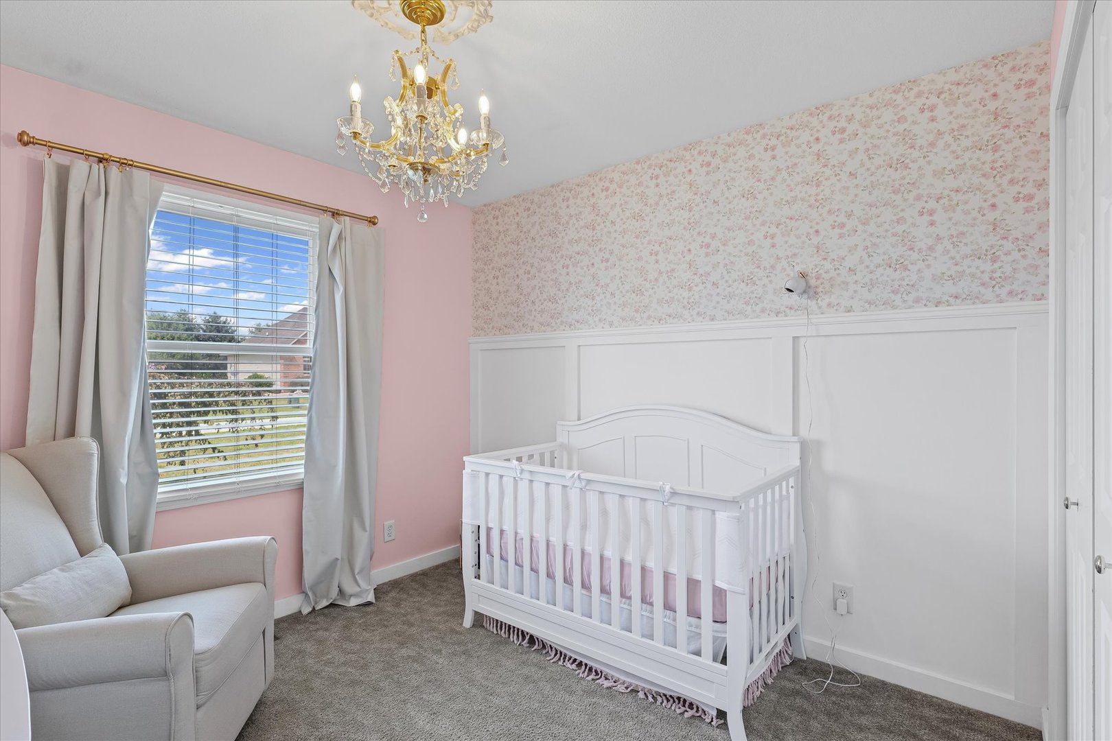 202 Hawk's Lane Broadlands, IL 61816 - Photo 20 of 31 a bedroom with a bed and a chandelier