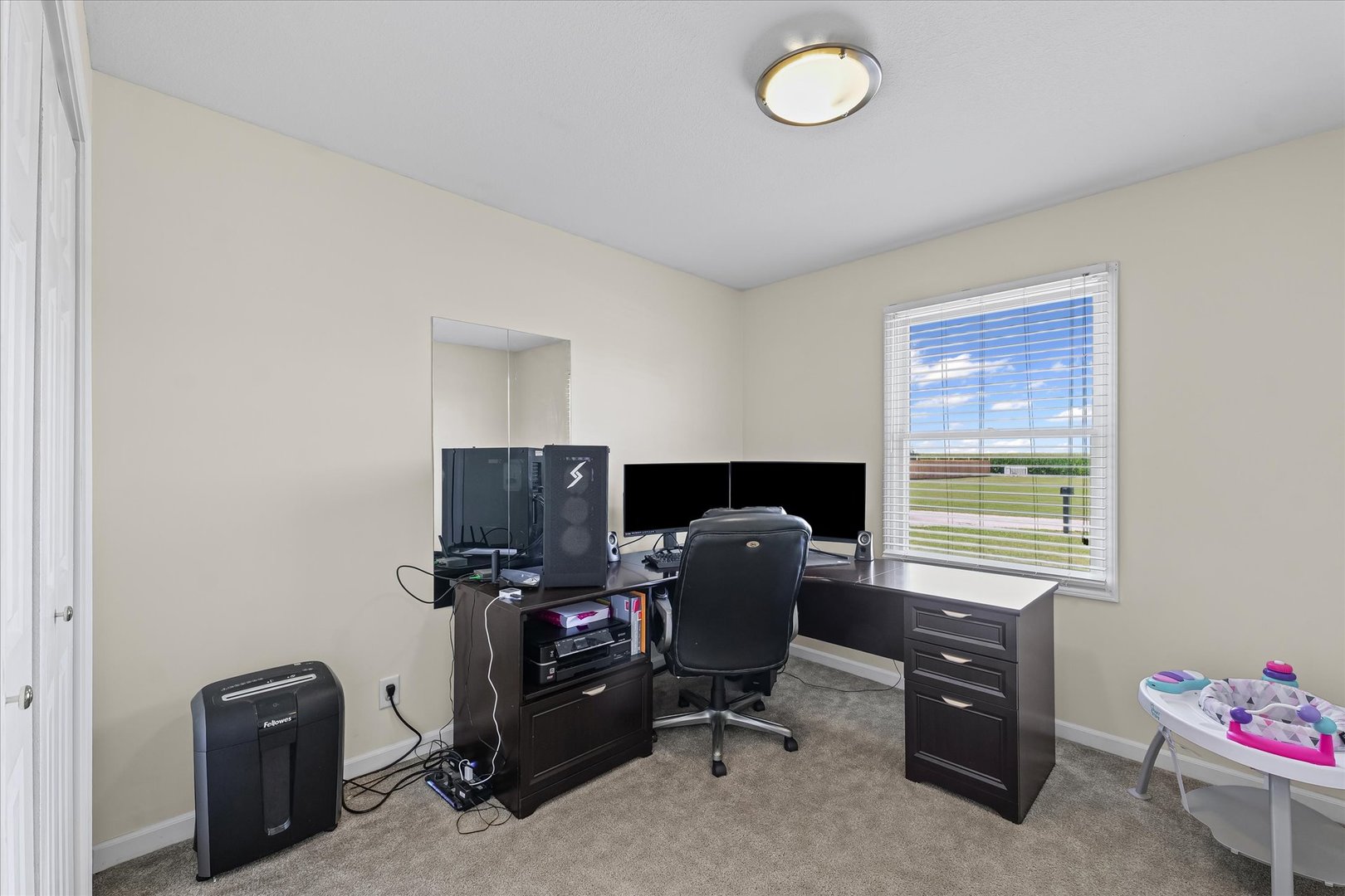 202 Hawk's Lane Broadlands, IL 61816 - Photo 22 of 31 a view of a workspace with furniture and a window