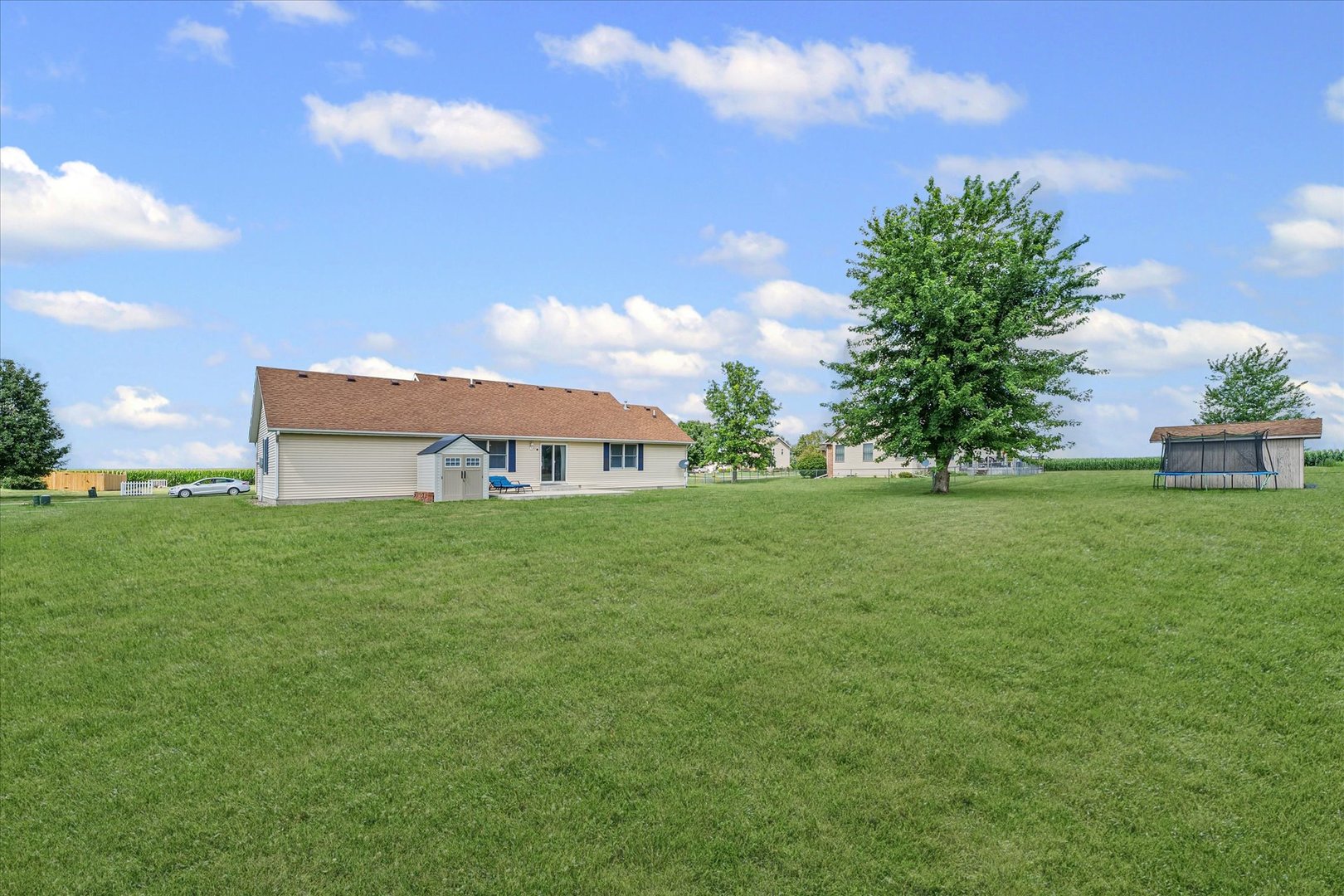 202 Hawk's Lane Broadlands, IL 61816 - Photo 30 of 31 a view of a house with a big yard