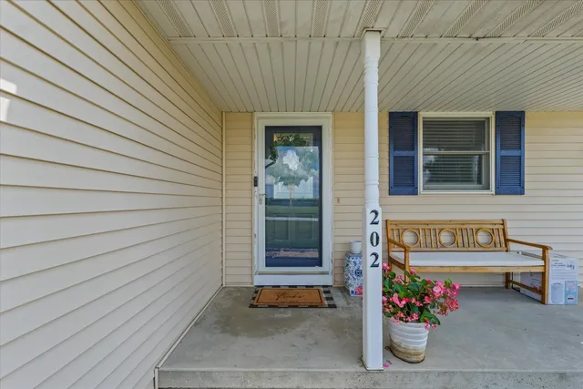a front view of a house with a garage