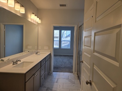 9714 Perdita Trail Missouri City, TX 77459 - Photo 13 of 18 Primary bathroom view into primary bedroom