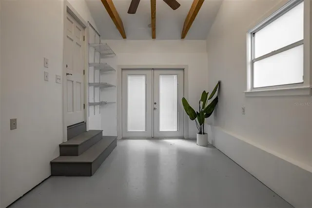 a view of an entryway with a livingroom