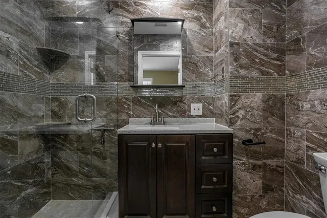 a bathroom with a sink and a toilet