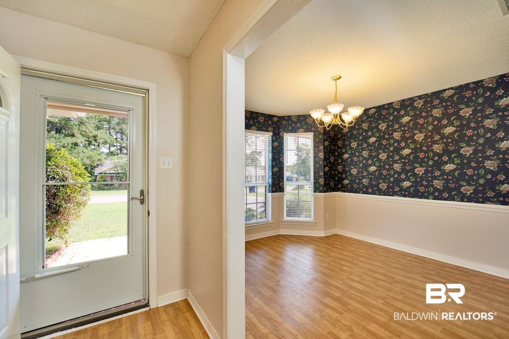 9385 Prairie Drive Semmes, AL 36575 - Photo 7 of 19 Enter & the dining room is on your left.