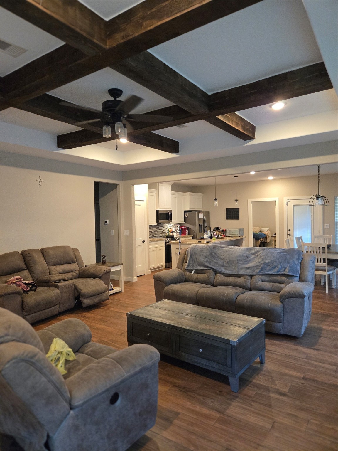 125 Smith Street Clute, TX 77531 - Photo 3 of 11 a living room with furniture and a wooden floor