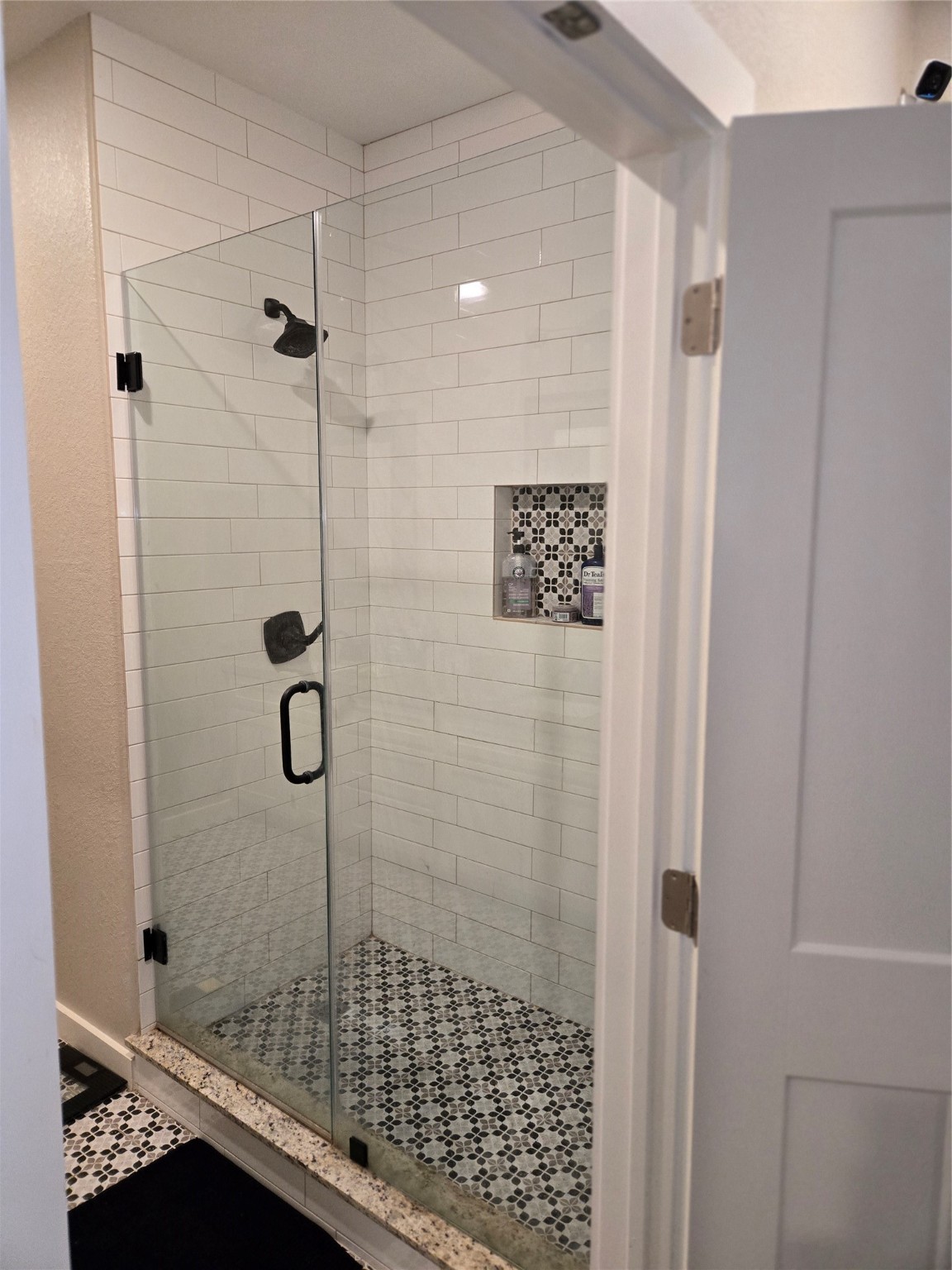 125 Smith Street Clute, TX 77531 - Photo 9 of 11 a bathroom with a shower