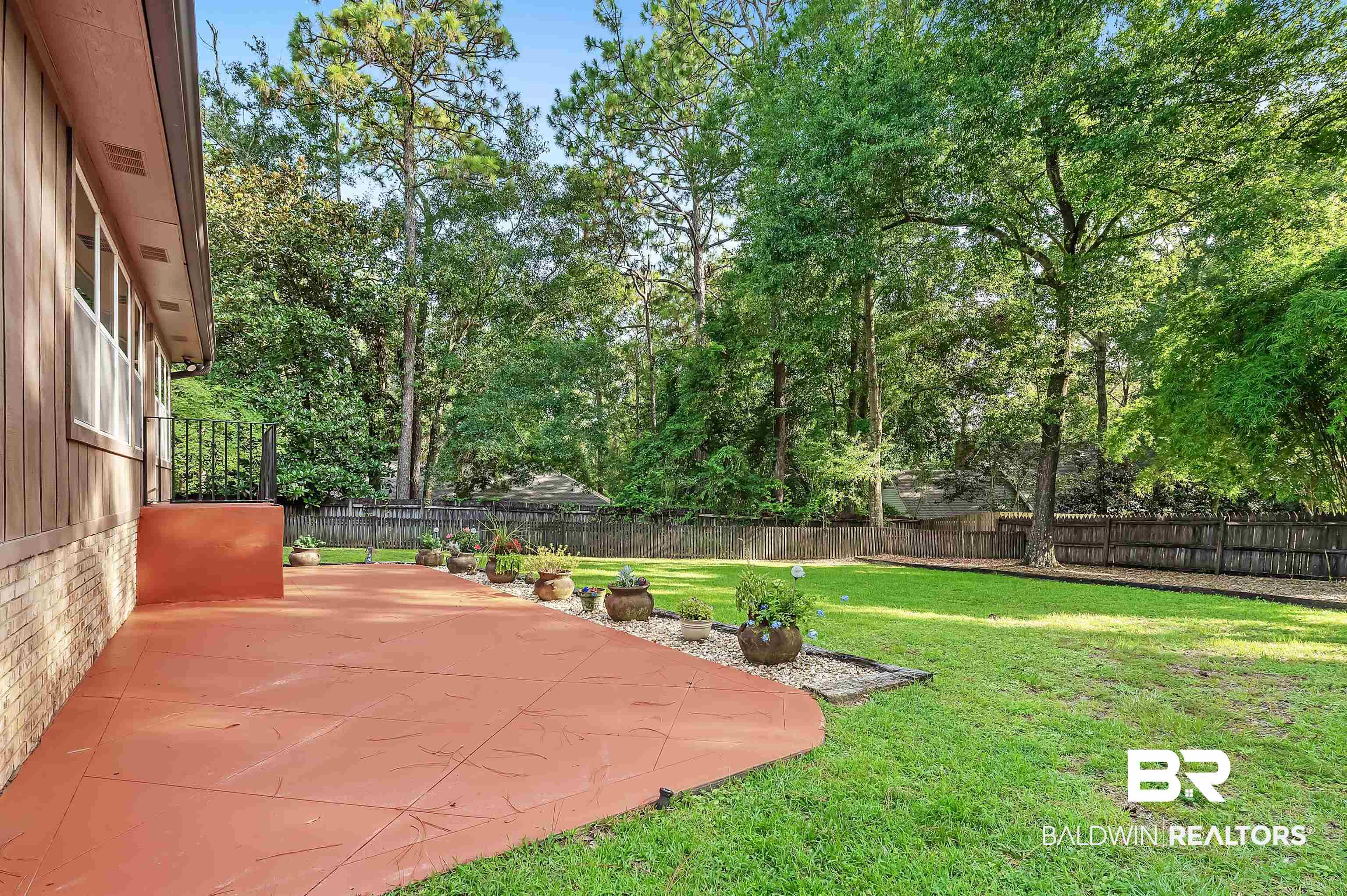 104 James Circle Daphne, AL 36526 - Photo 10 of 62 View of yard with a patio area