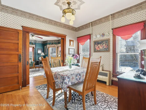 a view of a dining room with furniture window and outside view