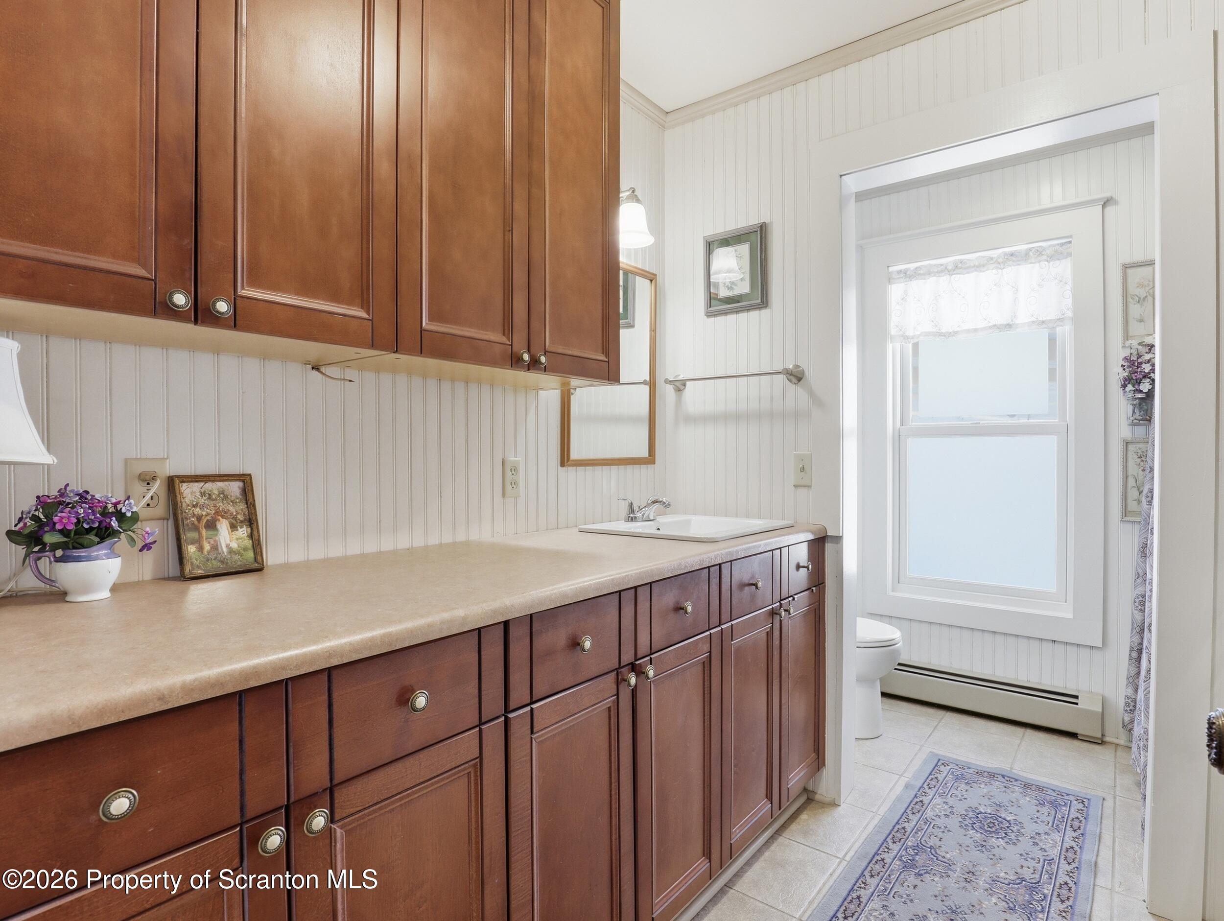 115 State Street Nicholson, PA 18446 - Photo 13 of 29 a kitchen with a sink and cabinets