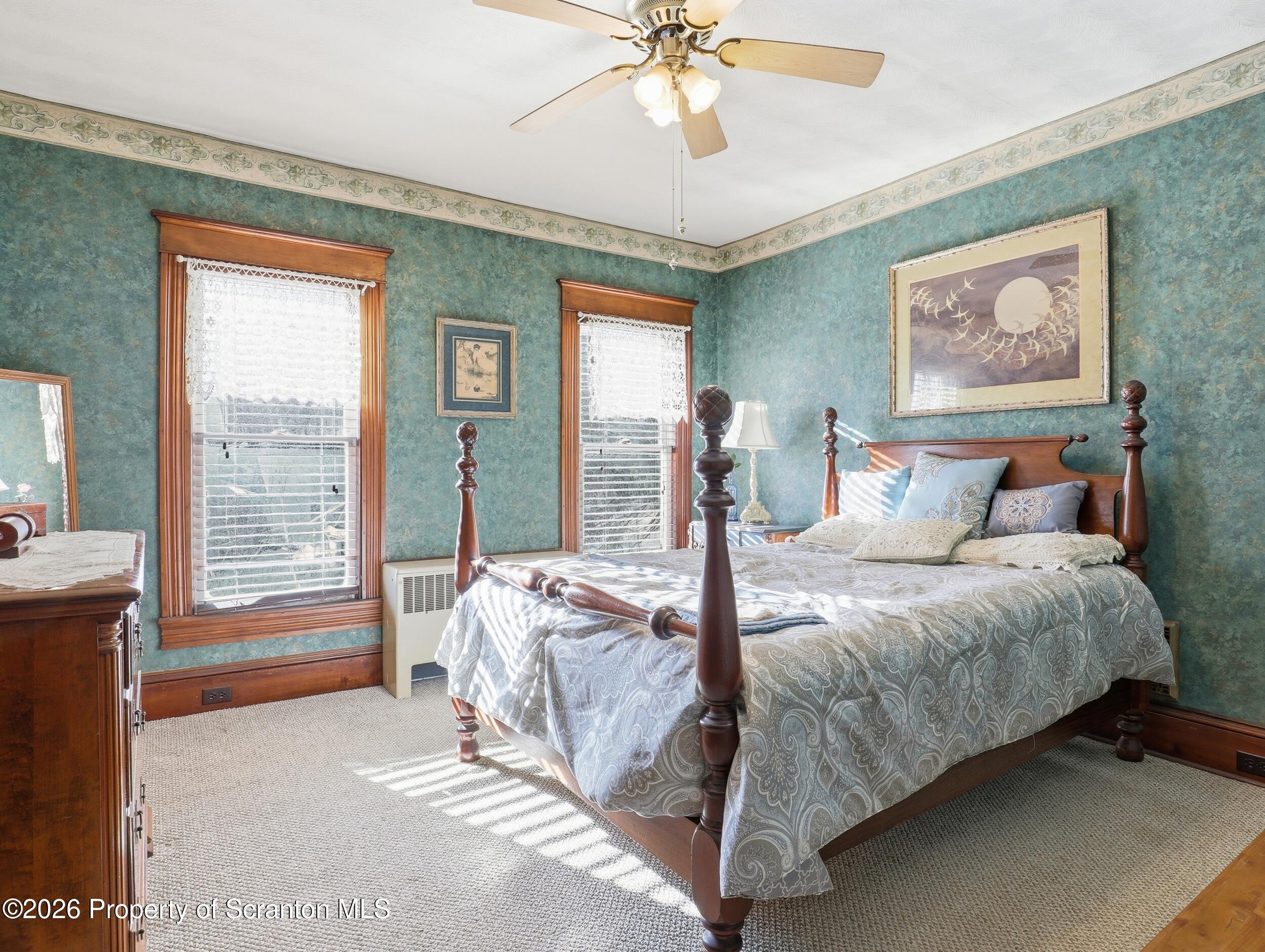 115 State Street Nicholson, PA 18446 - Photo 22 of 29 a bed sitting in a spacious bedroom next to a window
