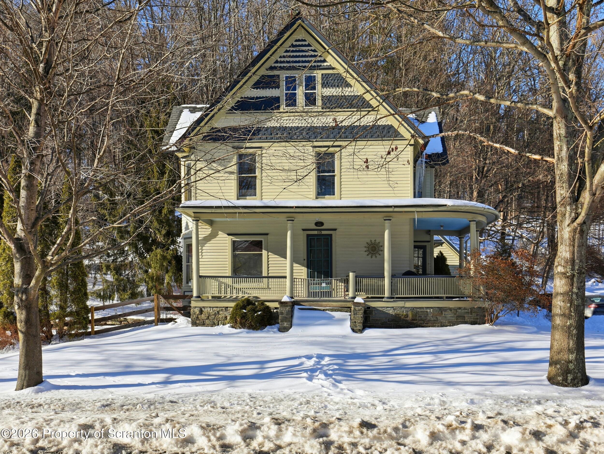 115 State Street Nicholson, PA 18446 - Photo 3 of 29 a front view of a house with a yard